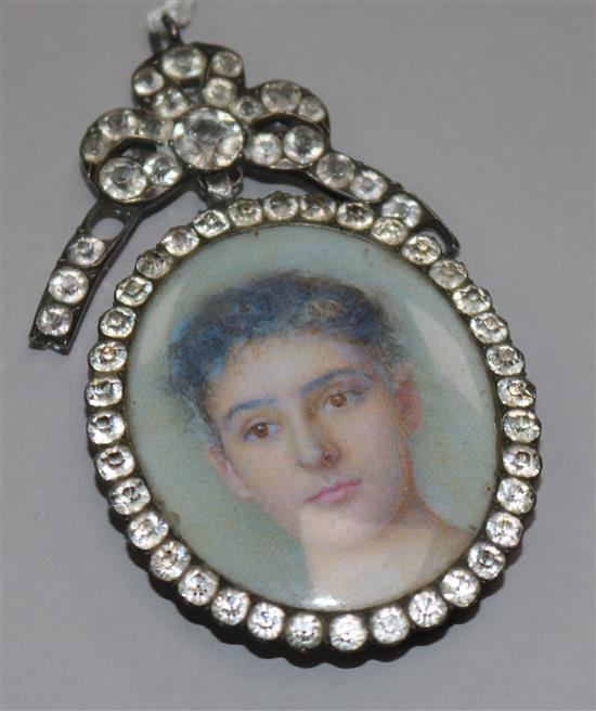 An Edwardian oil on ivory miniature, portrait of a lady, in a Georgian paste set silver frame, 4.5 x 4cm